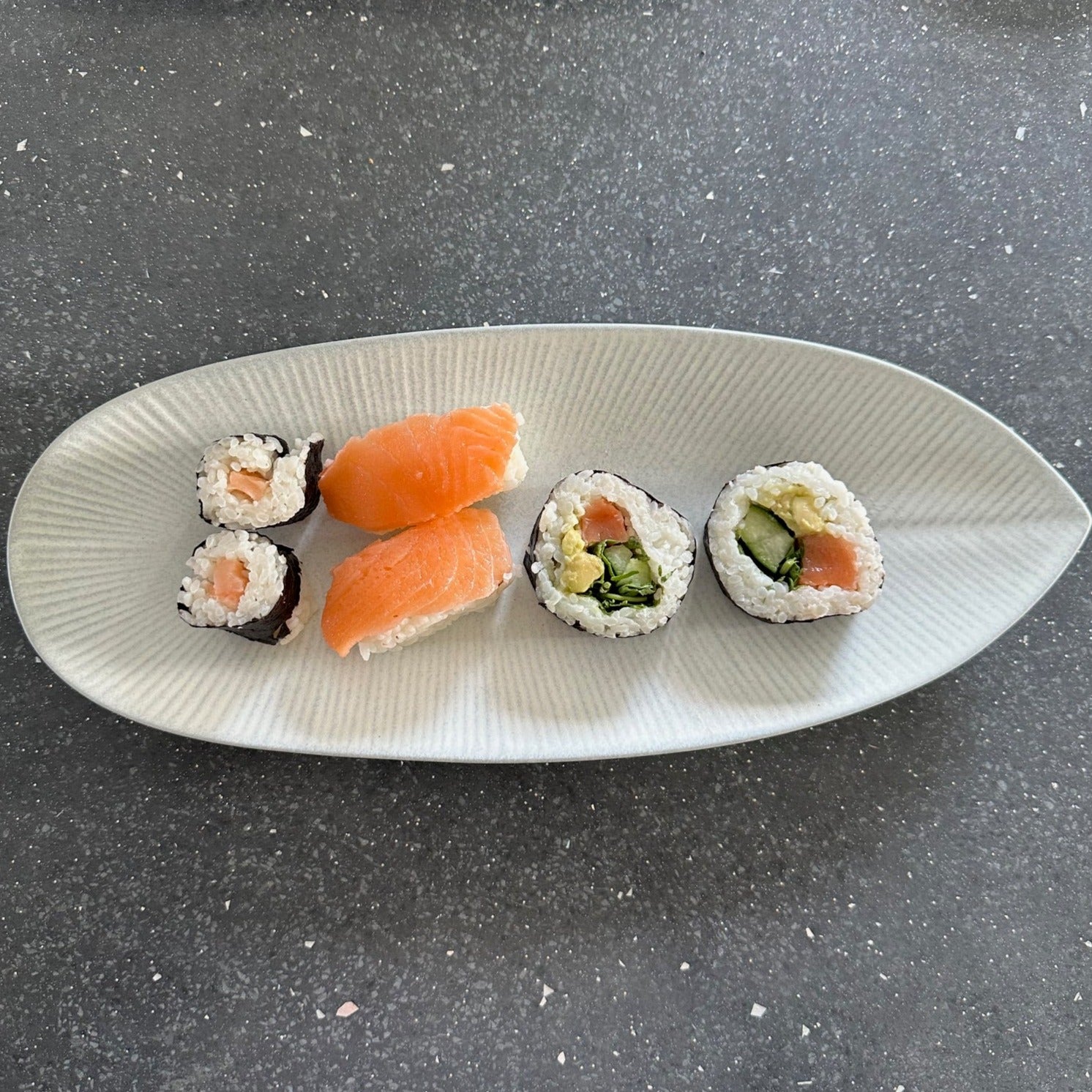 Japanese oval serving plate with sushi