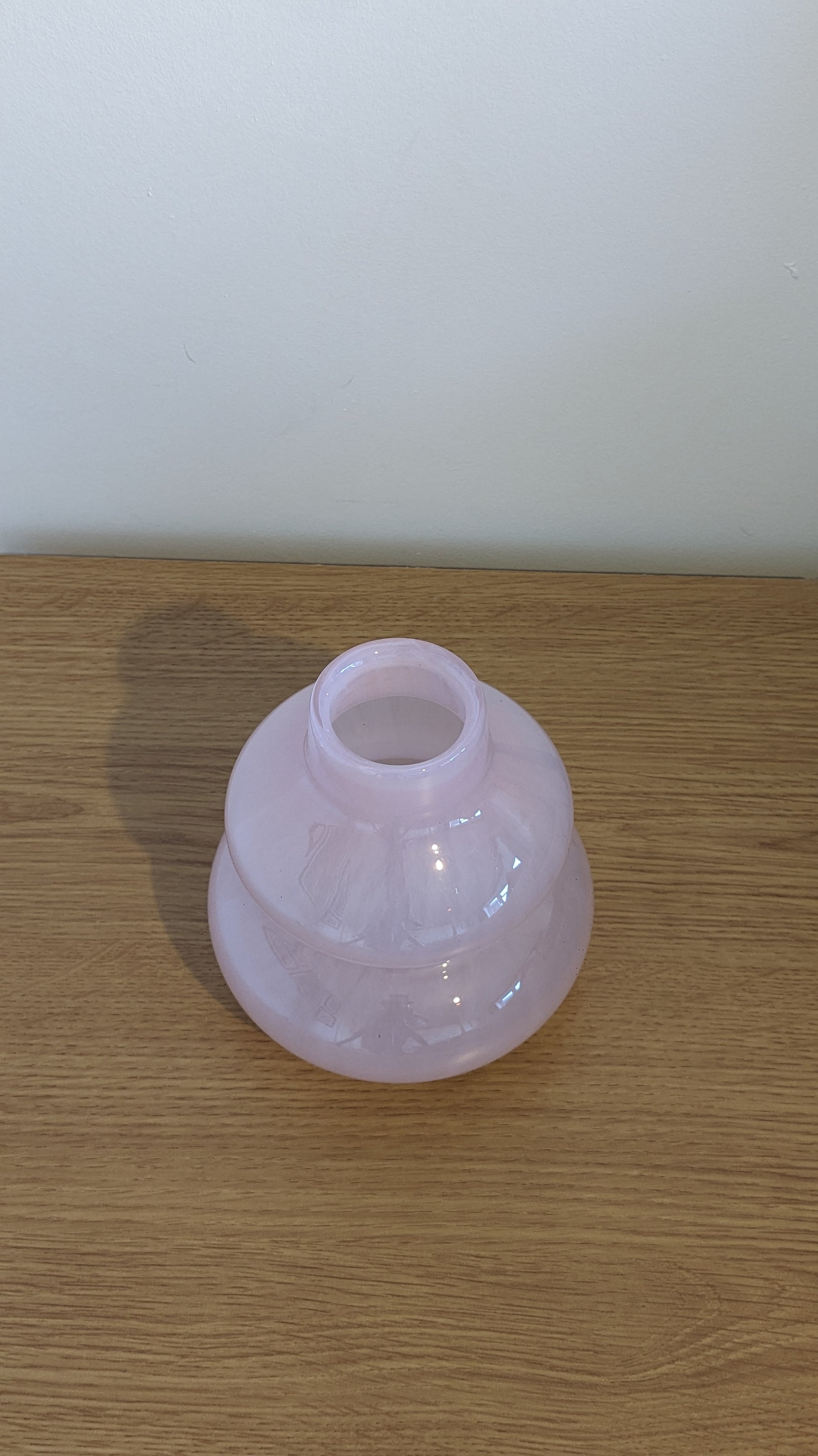 Small curved mouth blown vase pink